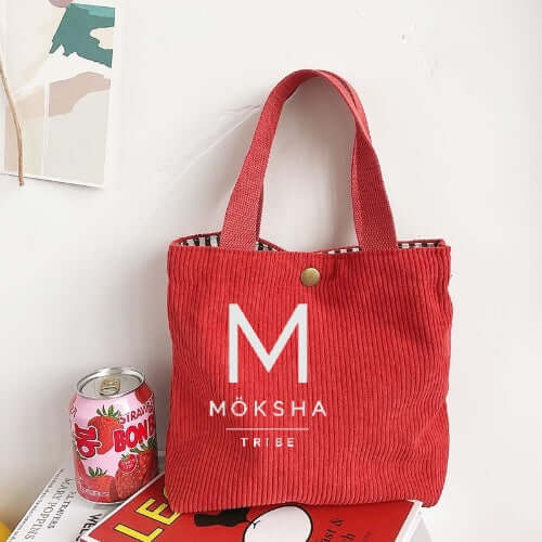 Möksha Tribe Tote Bag in red corduroy style, perfect for everyday wear and casual outings.