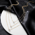 Layered Pendant Necklace Set in gold with crystal heart and star charms
