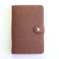 Felt Loose Leaf Notebook Journal in minimalist design with a dark grey felt cover and a button closure.