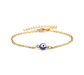 Evil Eye Bracelet with blue protective charm on adjustable gold stainless steel chain