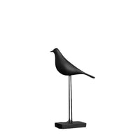 Modern minimalist bird figurine shown from a side angle