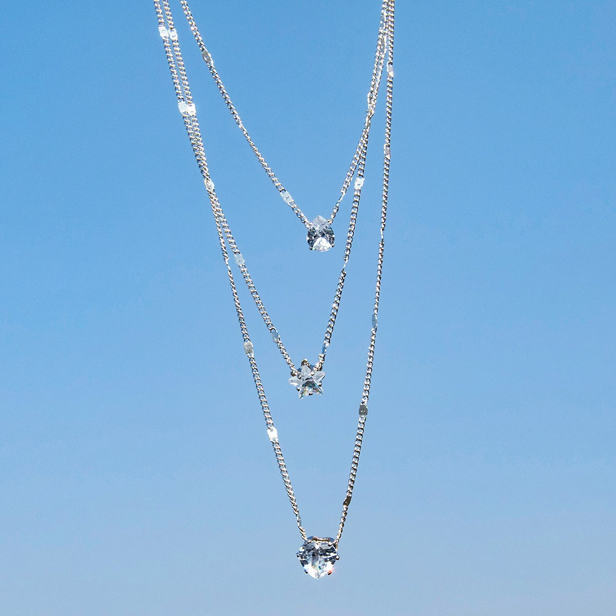 Layered Pendant Necklace Set in silver with sparkling crystal charm pendants