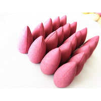 Backflow incense cones in assorted colors representing each available scent