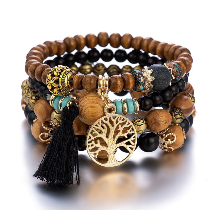 Wooden Beaded Bracelet Black bohemian bracelet with wooden beads and charm