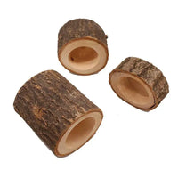 Close-up of the rustic wooden tealight candle holder's natural bark texture