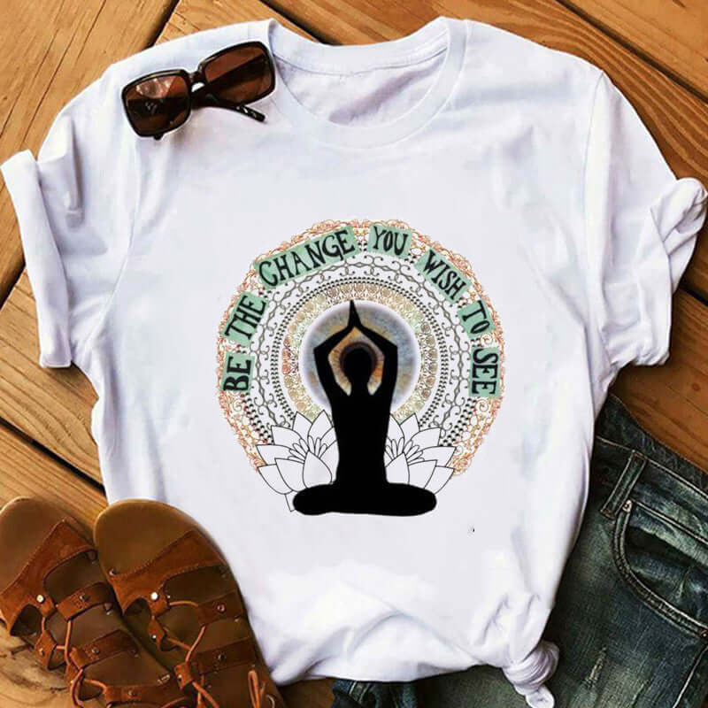 Buddha Wheel Meditation T-Shirt featuring a serene Buddha print and vibrant mandala design on a white tee.