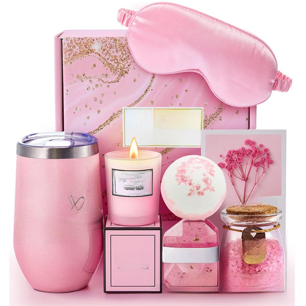Pink and purple spa gift box set with tumbler, candle, bath bomb, and silk sleep mask