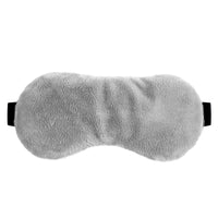 Gray fluffy eye mask on a white background