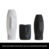 Nordic ceramic face-art vase in matte black finish
